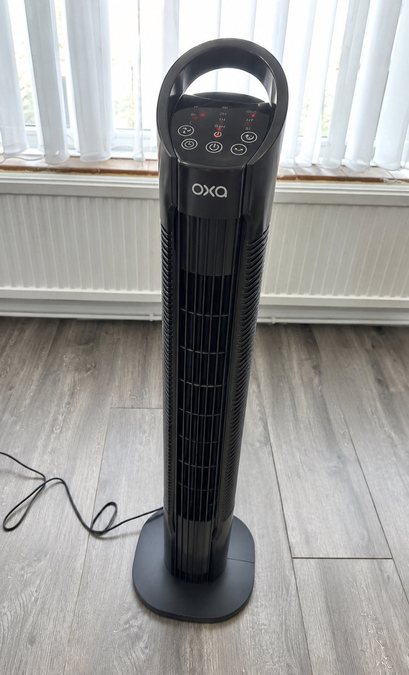 Oxa Tower Fan in front of a window